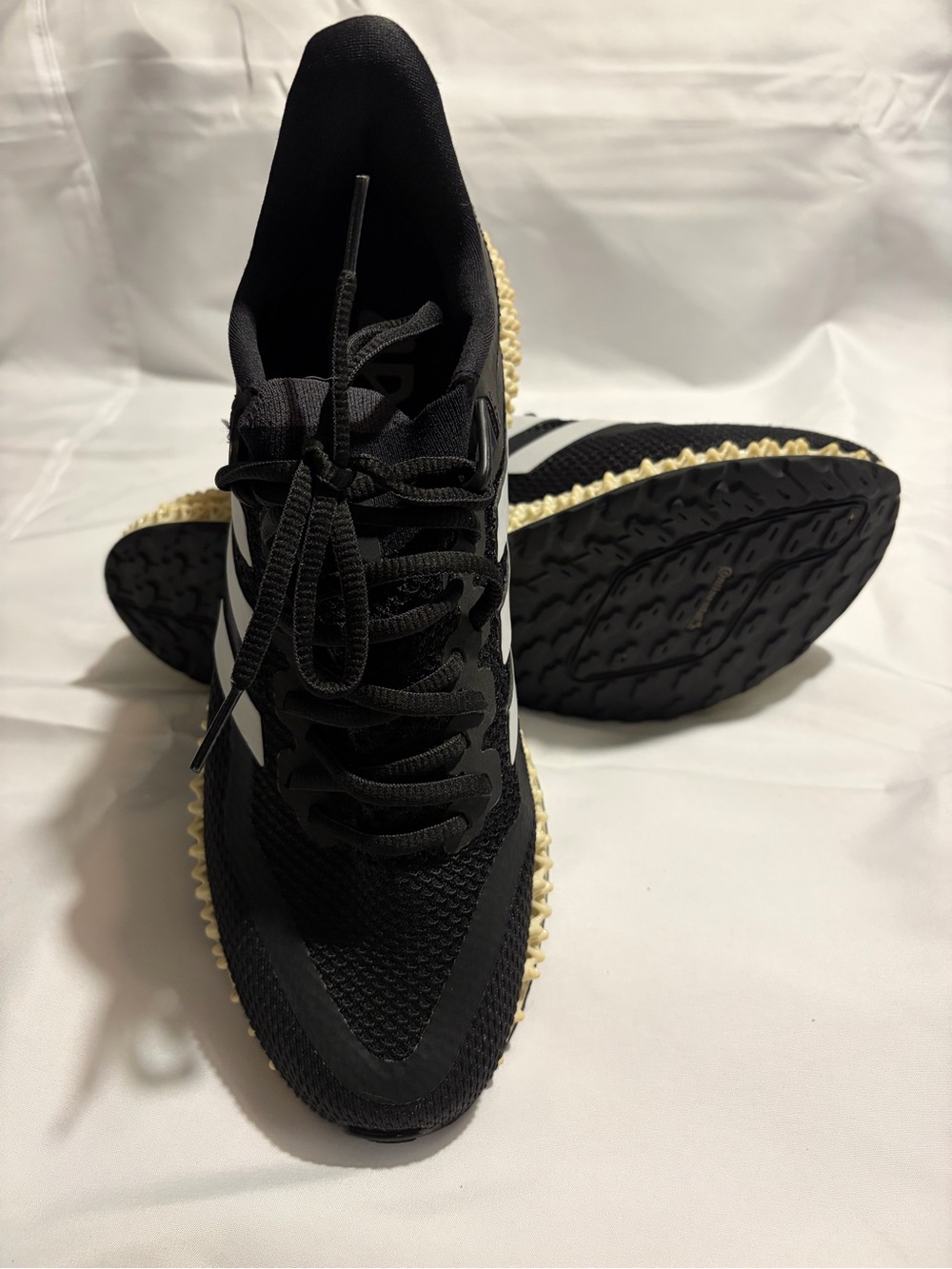 adidas 4DFWD women’s like new Black Athletic Sneakers with Cream Accent